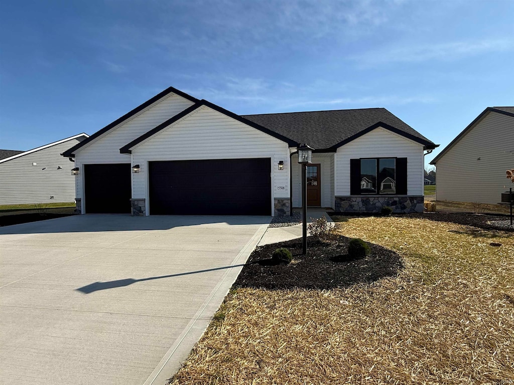 single story home featuring a garage