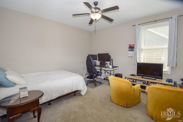 bedroom with ceiling fan and carpet floors