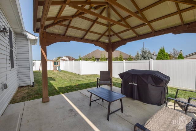 view of patio / terrace with a grill and a gazebo