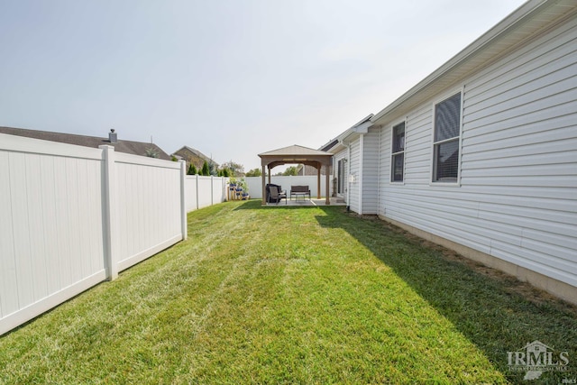 view of yard featuring a patio and a gazebo