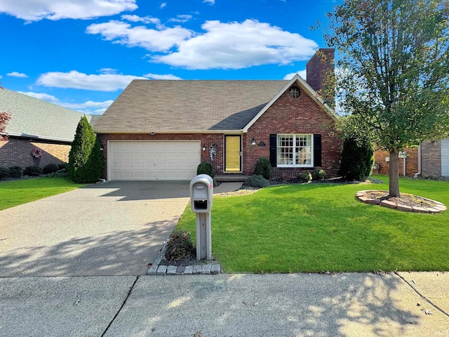 view of front of home with a garage and a front yard