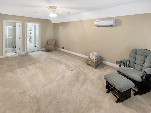 sitting room featuring an AC wall unit, light carpet, and ceiling fan