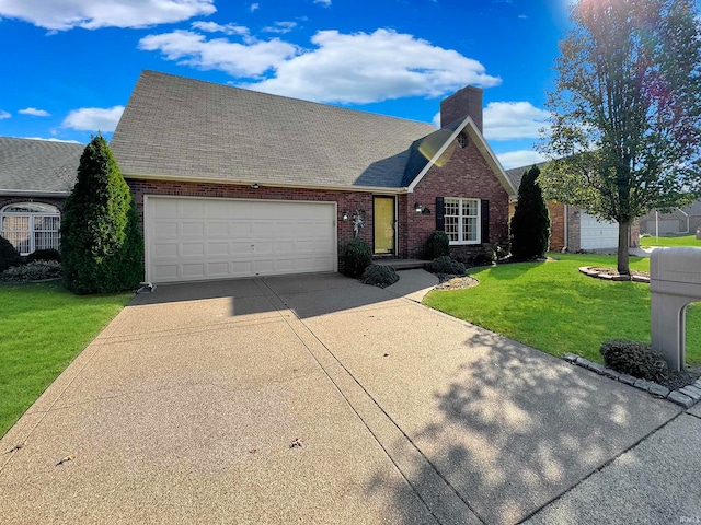 view of front of home featuring a garage and a front yard