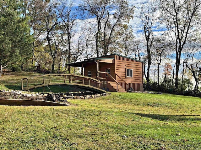 606 S 150 W, Washington, IN 47501 - view of home's exterior featuring a yard and stairs