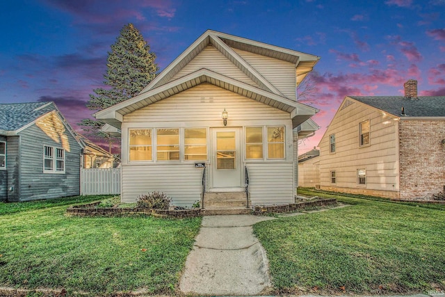 view of front of house with a lawn