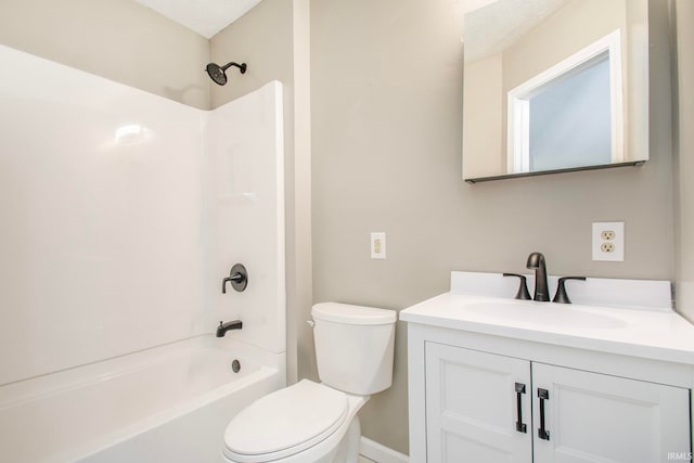 full bathroom with vanity, shower / tub combination, and toilet