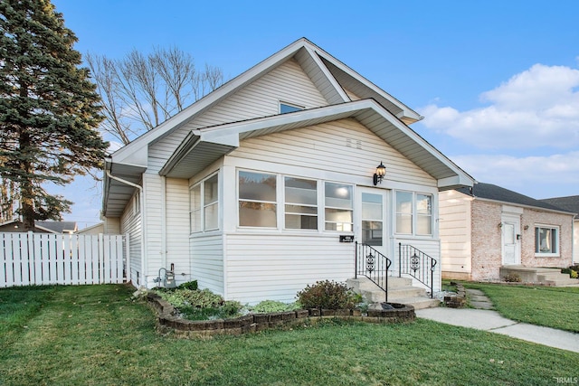 view of front of house with a front lawn