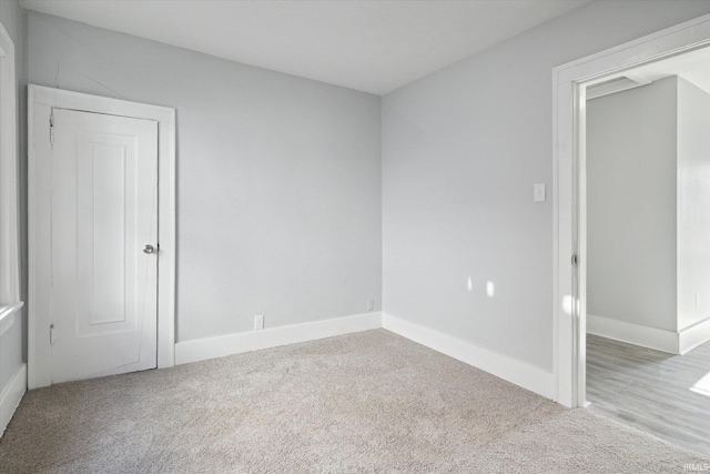 spare room with carpet floors