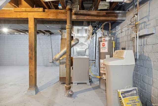 utility room with gas water heater