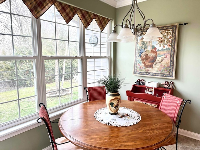 tiled dining area featuring a wealth of natural light and an inviting chandelier