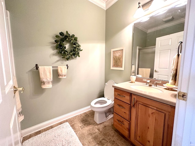 bathroom with ornamental molding, walk in shower, vanity, and toilet