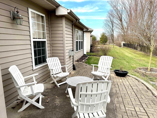 view of patio with an outdoor fire pit