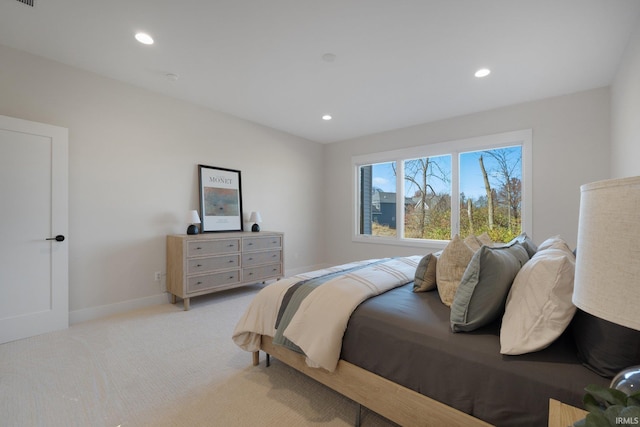 bedroom with light carpet