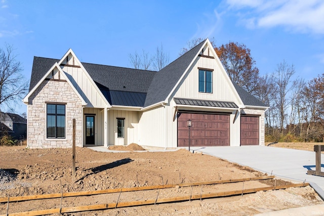 modern farmhouse style home featuring a garage