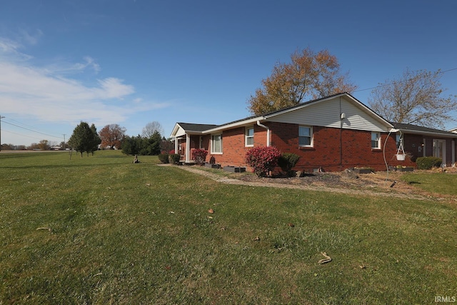 view of property exterior featuring a lawn