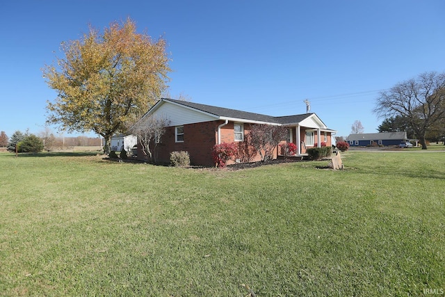 view of home's exterior featuring a yard