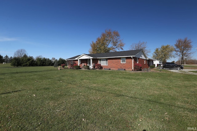 single story home featuring a front yard