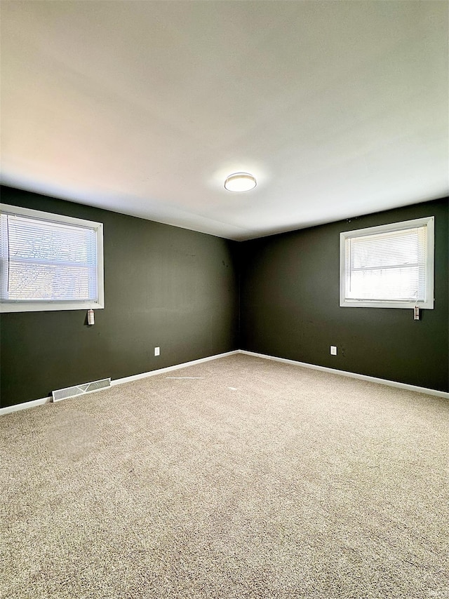 view of carpeted spare room