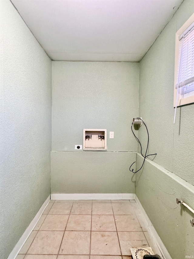 laundry room with hookup for a washing machine, light tile patterned flooring, and hookup for an electric dryer