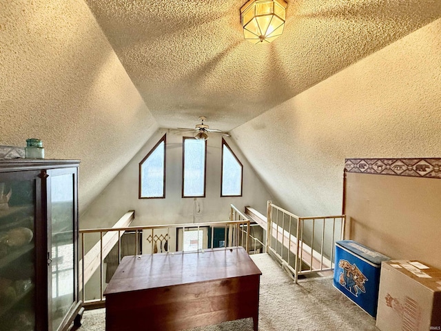 1839 S Meridian Rd, Mitchell, IN 47446 - home office featuring ceiling fan, carpet floors, vaulted ceiling, a textured ceiling, and a textured wall