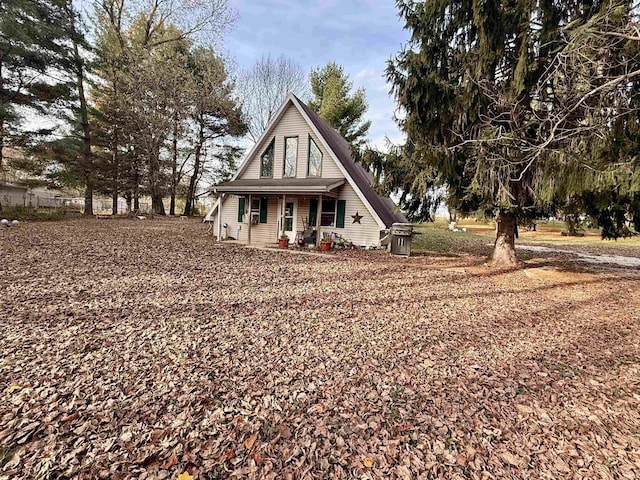 1839 S Meridian Rd, Mitchell, IN 47446 - view of front facade featuring a porch