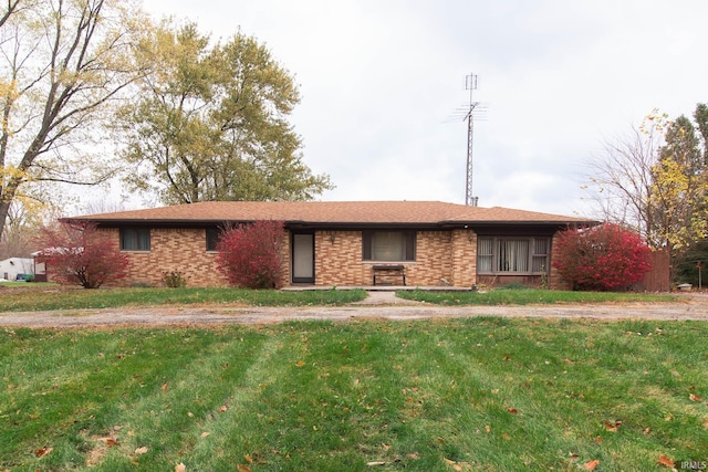 ranch-style house with a front yard