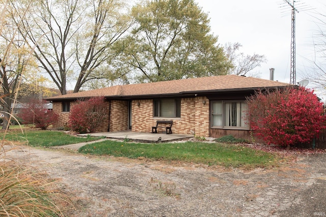 single story home with a patio