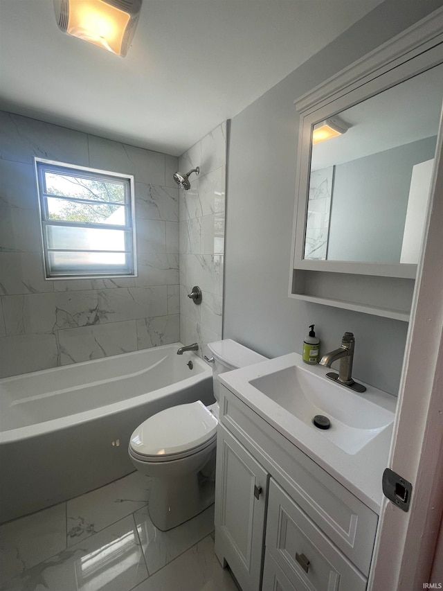 full bathroom with vanity, tiled shower / bath combo, and toilet