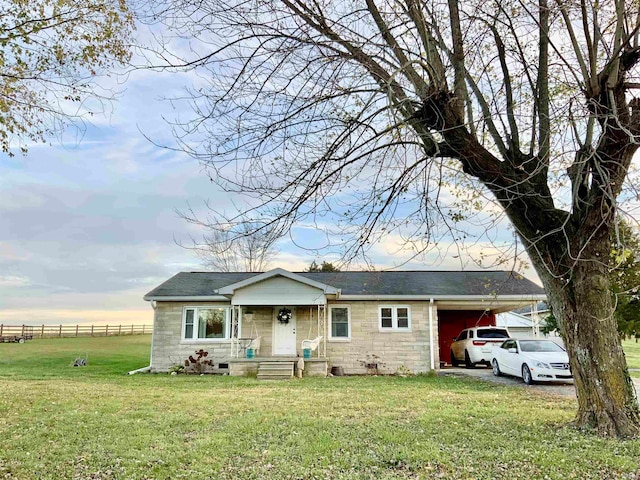 ranch-style house with a front yard