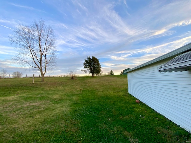 view of yard with a rural view