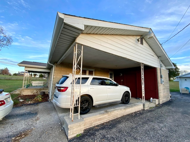 view of car parking with a carport