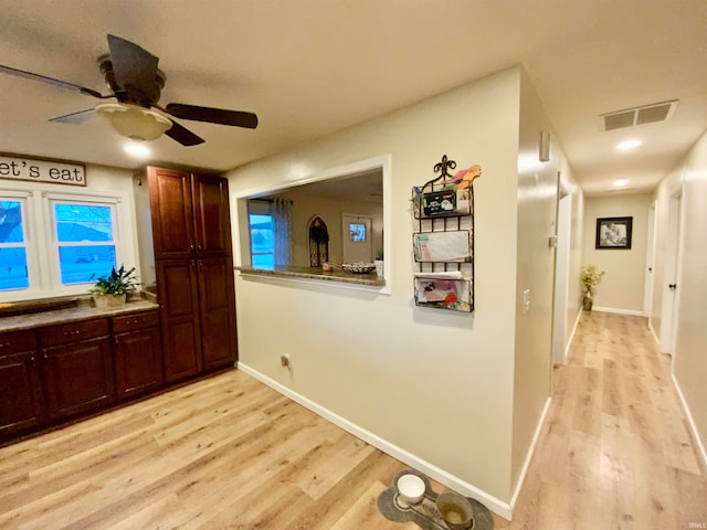 hallway featuring light hardwood / wood-style floors