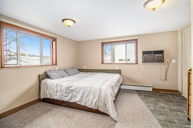 15560 County Road 44, Goshen, IN 46526 - bedroom featuring a baseboard radiator, a wall mounted AC, and baseboards