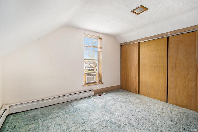 15560 County Road 44, Goshen, IN 46526 - additional living space with lofted ceiling, carpet floors, a baseboard radiator, and cooling unit