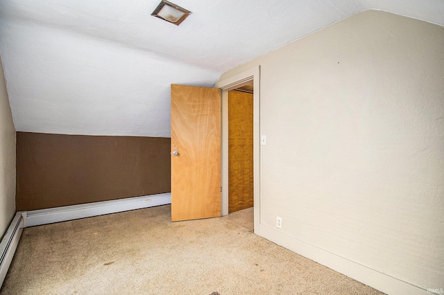 bonus room with a baseboard radiator, carpet flooring, a textured ceiling, and lofted ceiling