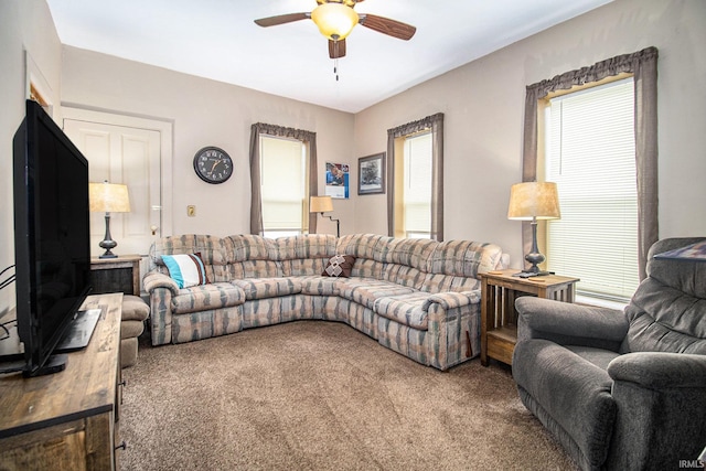 living room featuring ceiling fan, a healthy amount of sunlight, and carpet floors