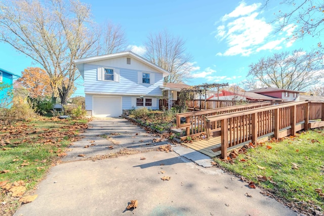 view of front facade featuring a garage and a deck