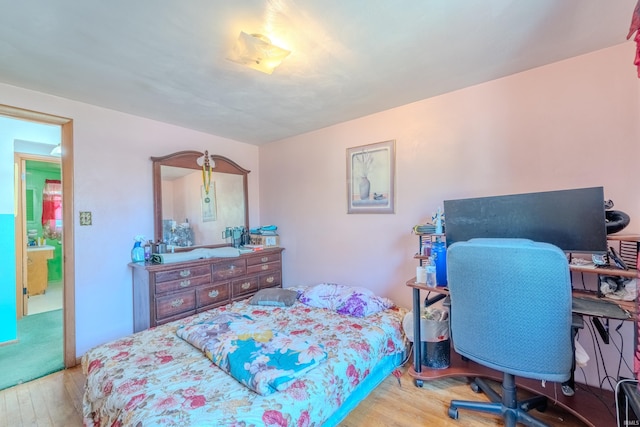 bedroom with light hardwood / wood-style flooring