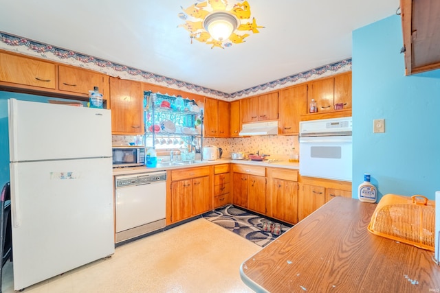 kitchen featuring backsplash and appliances with stainless steel finishes