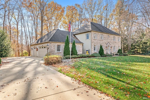 view of property exterior with a garage and a yard