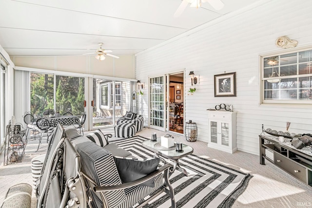 sunroom / solarium with lofted ceiling