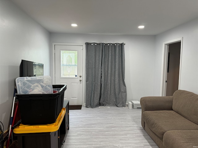 living room with light hardwood / wood-style floors