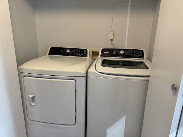 laundry room featuring independent washer and dryer