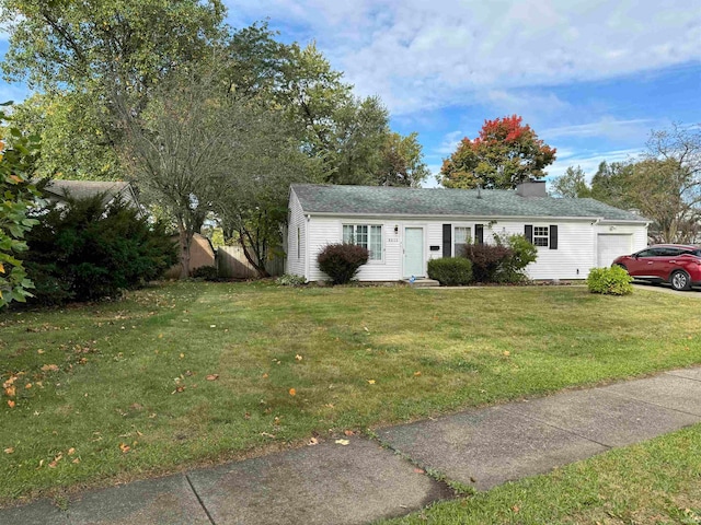 single story home with a front lawn