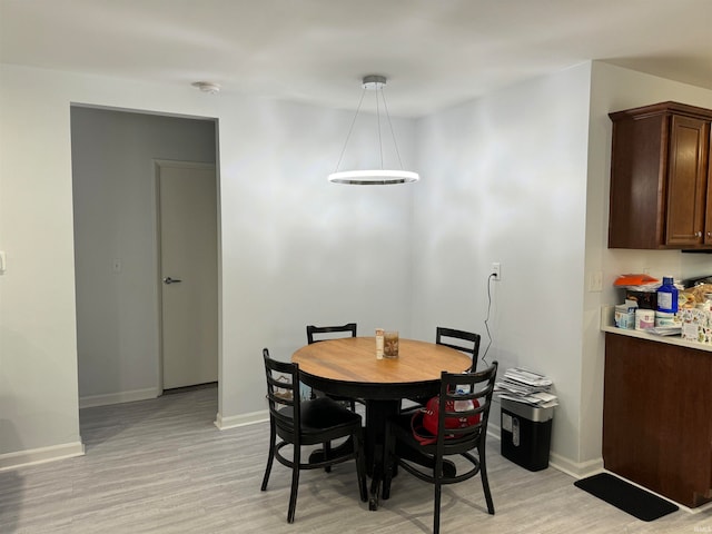 dining room featuring light hardwood / wood-style flooring