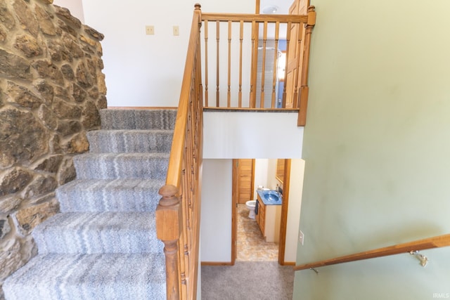 stairway with carpet floors