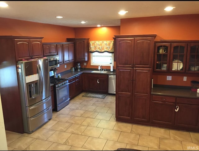 kitchen with sink and appliances with stainless steel finishes