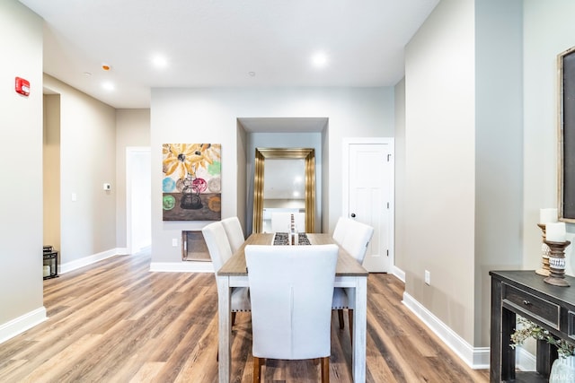 dining area featuring hardwood / wood-style flooring