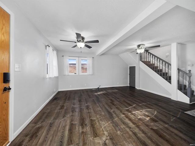 unfurnished living room with dark wood-type flooring and beam ceiling