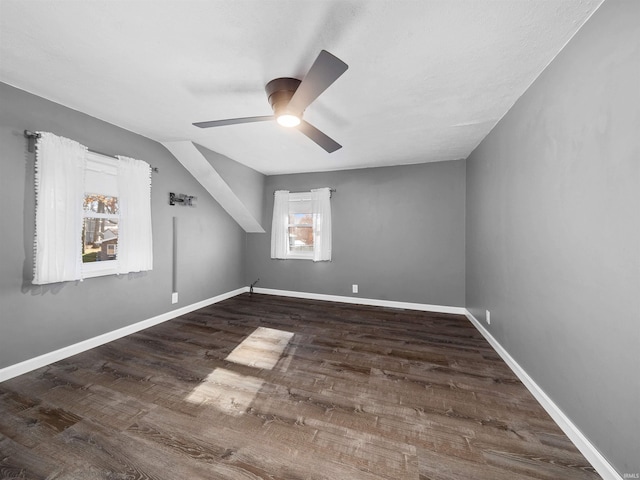 bonus room featuring dark hardwood / wood-style flooring and ceiling fan